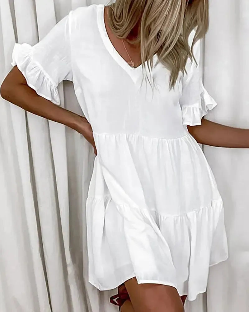 EP | Robe de loisirs simple avec col en V et ourlet à volants