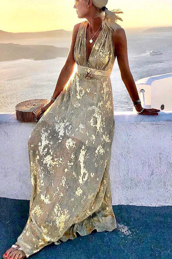 EP | Robe longue avec décolleté en V et paillettes dorées