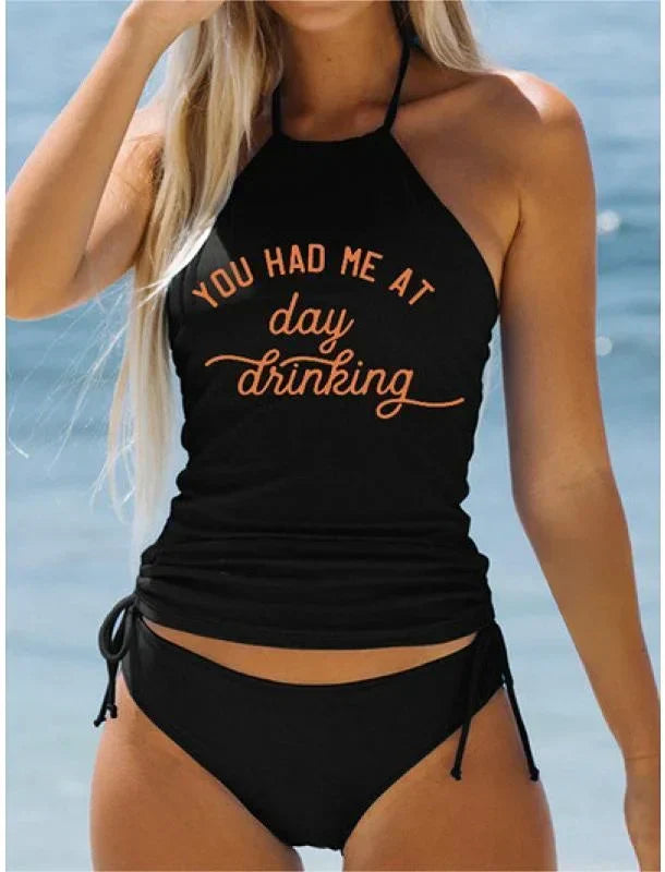 EP | Maillot de bain noir stylé avec imprimé dans le cou