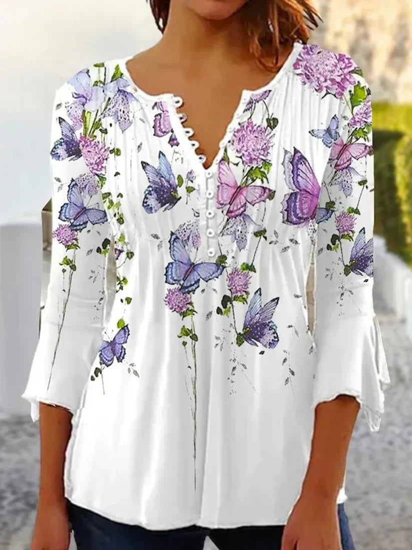 EP | Blouse imprimée stylée avec encolure en V et boutons