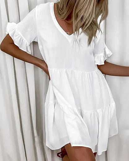 EP | Robe de loisirs simple avec col en V et ourlet à volants