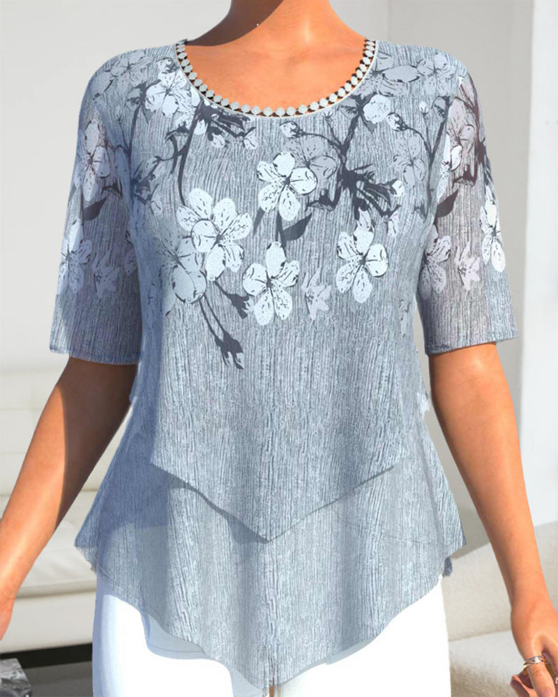 EP | Blouse à col rond fleuri et manches courtes