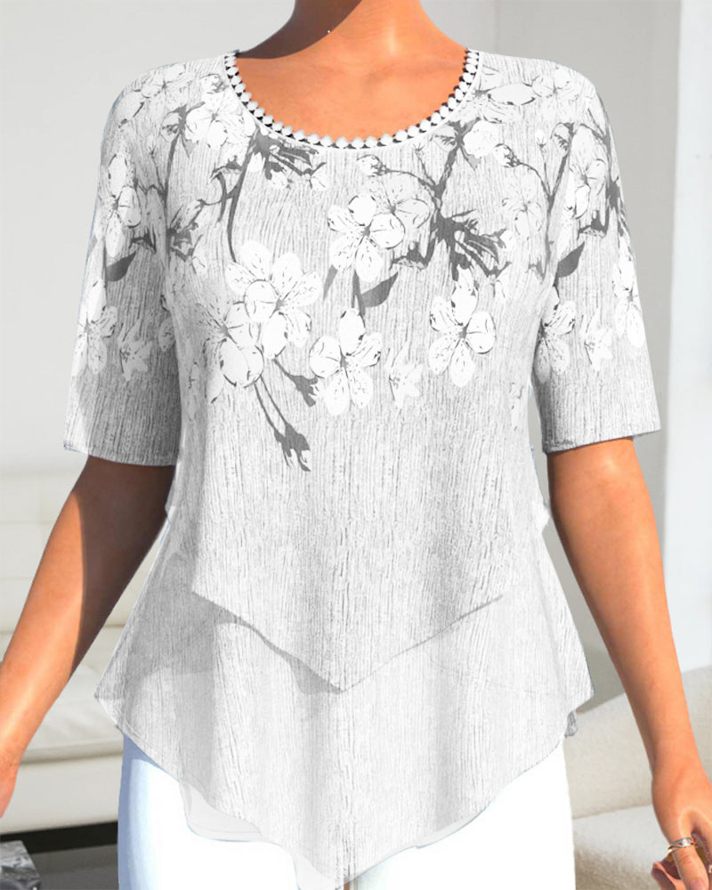 EP | Blouse à col rond fleuri et manches courtes