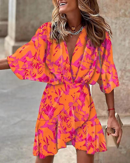 EP | Robe imprimée avec décolleté en V et manches chauve-souris