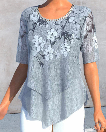 EP | Blouse à col rond fleuri et manches courtes