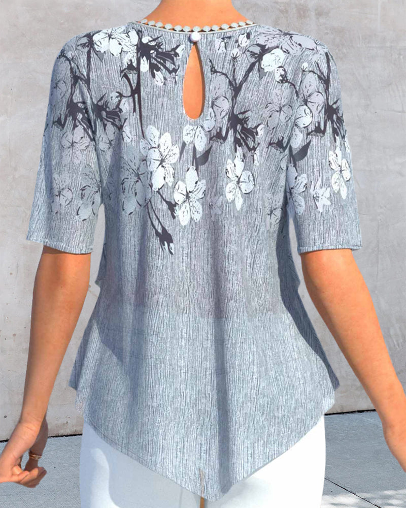 EP | Blouse à col rond fleuri et manches courtes