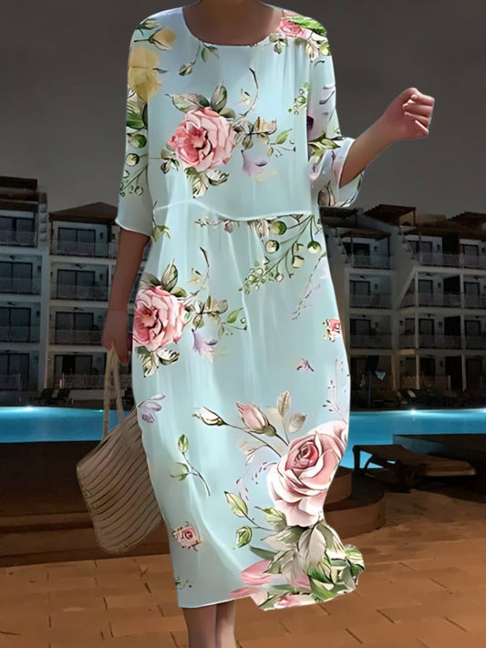 EP | Robe midi élégante en matière légère et fluide, manches 3/4 avec imprimé floral