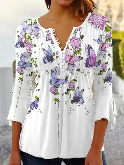 EP | Blouse imprimée stylée avec encolure en V et boutons